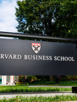 Boston, Massachusetts, USA - September 24, 2024:  Close-up of the sign in front of the Baker LIbrary/Bloomberg Center entrance. The Baker Library/Bloomberg Center is a building complex at Harvard University's Harvard Business School in Boston. It includes the Baker Library, built in 1927, and the Bloomberg Center, completed in 2005. Harvard Business School (HBS) is the graduate business school of Harvard University. It is consistently ranked among the top business schools in the world and offers a full-time MBA program, management-related doctoral programs, and executive education programs.